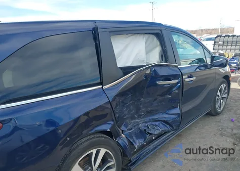 2022 Honda Odyssey Touring z USA, uszkodzony, nr VIN 5FNRL6H8XNB057584